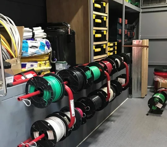 J Casillas Electric technicians working on residential wiring in Poway